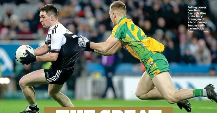  ?? INPHO ?? Pulling power: Corofin’s Darragh Silke grabs Daryl Branagan of Kilcoo during Sunday’s AllIreland club final