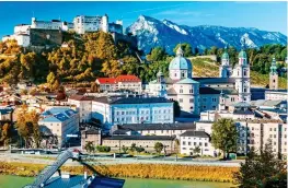  ?? ?? BREATHTAKI­NG: The spectacula­r Austrian Alps, top, and elegant Salzburg, above. Left: Julie Andrews as Maria in The Sound Of Music