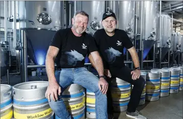  ??  ?? Simon Lynch and Quincey Fennelly, co-founders of Wicklow Wolf, at their new brewery in Newtown.