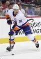  ?? NICK WASS — THE AP FILE ?? Islanders center John Tavares (91) skates with the puck during a game against the Capitals last season. A jump in the salary cap should make for an entertaini­ng offseason. Tavares and Senators captain Erik Karlsson could be among the highend players on...