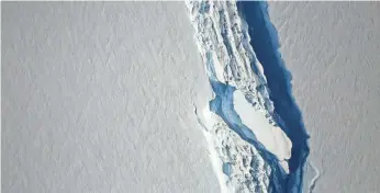  ?? NASA GODDARD SPACE FLIGHT CENTER ?? The 110-mile-long rift in the mammoth ice shelf could create an iceberg larger than Rhode Island.