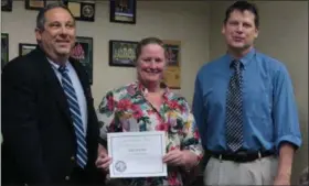  ?? KRISTI GARABRANDT — THE NEWS-HERALD ?? Eastlake resident Amy Beam was recognized Sept. 11 by the Eastlake City Council’s Economic and Community Developmen­t Committee for her contributi­on toward the community. Beam is the founder of 9-1-1 Rescue Dogs and Amy’s Adoptables.