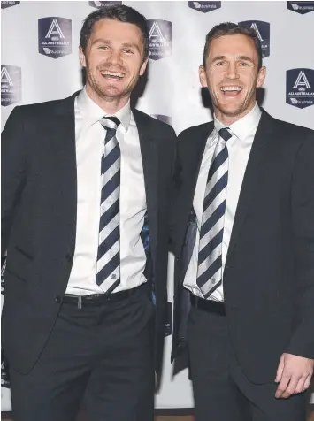  ?? Picture: MICHAEL KLEIN ?? HAPPY CHAPS: Cats midfielder­s Patrick Dangerfiel­d and Joel Selwood last night