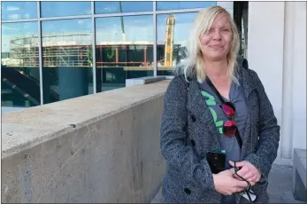  ??  ?? The Associated Press
Jennifer Brownlee, of Bayou La Batre, Ala., poses for a picture at Tampa Internatio­nal Airport. Millions of Americans are travelling ahead of Christmas and New Year's, despite pleas from public health experts that they stay home.