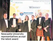  ??  ?? Newcastle University representa­tives accept the latest award