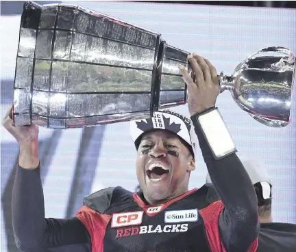 ?? FRANK GUNN/THE CANADIAN PRESS ?? Henry Burris, celebratin­g the Redblacks’ Grey Cup win in November, is expected to announce his retirement today.