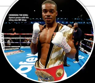  ??  ?? CROWNING THE KING: Spence poses with his shiny new IBF strap
