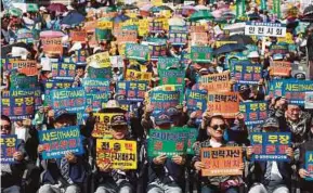  ?? EPA PIC ?? South Korean veterans protesting North Korea’s nuclear test in Seoul yesterday.