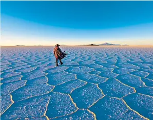  ?? ?? Sparkle and shimmer: Salar de Uyuni, in the Andes in south-west Bolivia, is the world’s largest salt flat