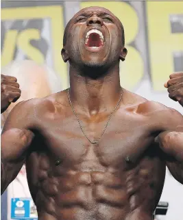  ?? JOHN LOCHER/THE ASSOCIATED PRESS FILE ?? Andre Berto, above, figures to get another shot at the welterweig­ht title, and taking down Shawn Porter is key to secure a title bout.