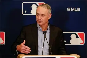  ?? AP PHOTO BY JOHN RAOUX ?? MLB Commission­er Rob Manfred answers questions at a press conference during MLB baseball owners meetings, Thursday, Feb. 6, 2020, in Orlando, Fla.