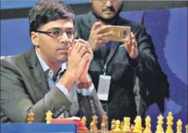  ?? SAMIR JANA/HT PHOTO ?? ▪ Viswanatha­n Anand will have a chance to avenge his loss to SS Ganguly, on Tuesday.