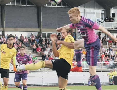  ??  ?? Duncan Watmore threatens the Stade Nyonnais defence in last night’s 2-0 friendly success. Match analysis on pages 46-47