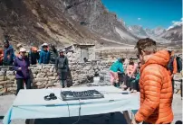  ?? AFP ?? Paul Oakenfold performs a practice set at Pheriche village on his way to Mount Everest’s base camp . —