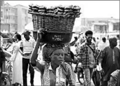  ?? SUNDAY ALAMBA/AP ?? A woman sells fish Friday in Lagos, Nigeria. Before Thursday, President Donald Trump largely had ignored Africa.