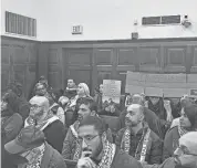  ?? DEREK KREIDER ?? Citizens pack an Akron City Council meeting in November.