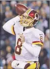  ?? Matt Rourke
Associated Press ?? WASHINGTON quarterbac­k Kirk Cousins had 15 touchdowns with no intercepti­ons in his last seven games.