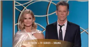  ?? (NBC via AP) ?? Kyra Sedgwick (left) and Kevin Bacon present the award for Best Actress in a Television Drama Series at the Golden Globe Awards.