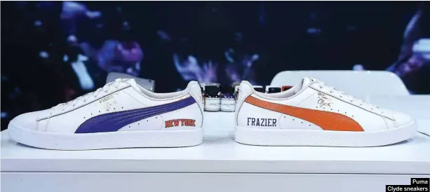  ??  ?? Puma Clyde sneakers