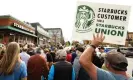  ?? Photograph: Lindsay Dedario/Reuters ?? People gather outside a Starbucks store while singer Billy Bragg performs for striking Starbucks Workers United Union members in Buffalo, New York, on October 12.