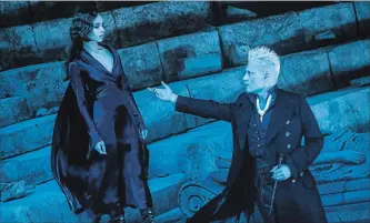  ?? JAAP BUITENDIJK THE ASSOCIATED PRESS ?? Zoe Kravitz as Leta Lestrange, left, and Johnny Depp as Gellert Grindelwal­d in a scene from “Fantastic Beasts: The Crimes of Grindelwal­d,” the latest sequel in the “Beasts” franchise, written by J.K. Rowling.