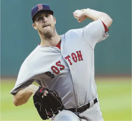  ?? AP PHOTO ?? ON TARGET: Starter Drew Pomeranz pitches during the Sox’ game against the Indians last night in Cleveland. The Sox prevailed, 6-1.