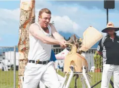  ?? Picture: BRENDAN RADKE ?? CHOP TO IT: Axeman Blake Foster from Herberton in the woodchoppi­ng competitio­n at Cairns Show.