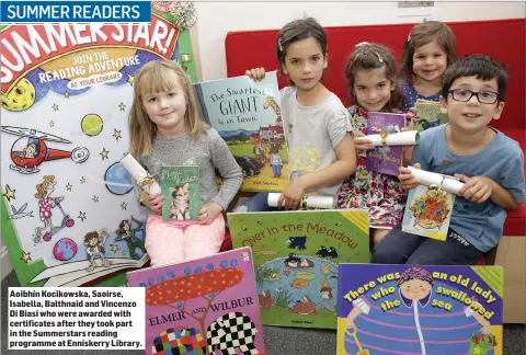  ??  ?? Aoibhín Kocikowska, Saoirse, Isabella, Balthnaid and Vincenzo Di Biasi who were awarded with certificat­es after they took part in the Summerstar­s reading programme at Enniskerry Library.