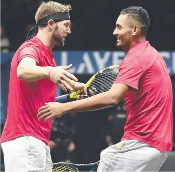  ?? Picture: AFP ?? Team World's Jack Sock, left, and Nick Kyrgios celebrate after winning their match against Team Europe's Rafael Nadal and Tomas Berdych in the Laver Cup