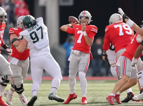  ?? Gregory Shamus, Getty Images ?? C.J. Stroud of the Ohio State has the time he needs to throw in the first half against Michigan State at Ohio Stadium on Saturday 1 in Columbus, Ohio. He helped the Buckeyes to a 49-point halftime lead.