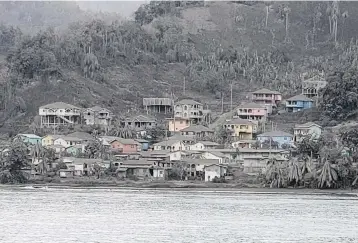  ?? National Emergency Management Organizati­on ?? Heavy ash covers Fitz Hughes in St. Vincent on Monday. A large explosion by the La Soufrière volcano early Monday produced dangerous pyroclasti­c flows traveling faster than a river down the mountain.