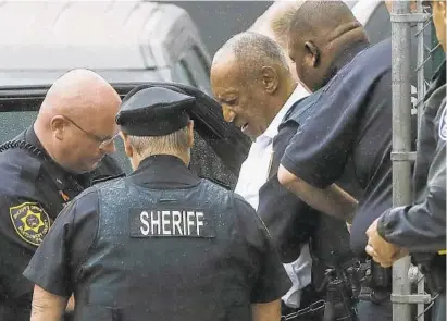  ?? MATT ROURKE/ASSOCIATED PRESS ?? Bill Cosby departs from his sentencing hearing at the Montgomery County Courthouse in Norristown, Pa. Cosby left in handcuffs to begin serving a 3-to-10-year prison sentence for sexual assault.
