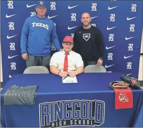  ?? / Contribute­d ?? Ringgold senior baseball player Caleb Stevens is joined by head coach Brent Tucker and assistant coach Drew Walker as he signed to continued his career at Bryan College last week.