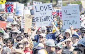  ?? JOSH EDELSON / ASSOCIATED PRESS ?? ABOVE: People hold up signs and shout while listening to speakers during a “Rally Against Hate” in Berkeley, Calif., on Sunday.