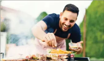  ?? ADOBE STOCK IMAGES ?? Live-fire cooking, and outdoor cooking in general, continues to grow.