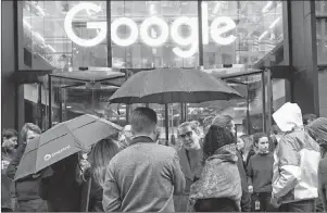  ?? AP PHOTO ?? People outside the Google offices in Granary Square, London, Thursday.