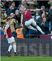  ??  ?? Marko Arnautovic celebrates his winner for West Ham as they upset the defending champions.