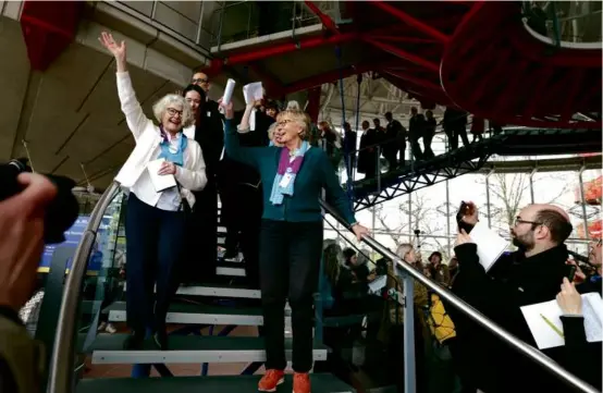  ?? FREDERICK FLORIN/AFP VIA GETTY IMAGES ?? Members of Senior Women for Climate Protection celebrated Tuesday’s ruling from the European Court of Human Rights.