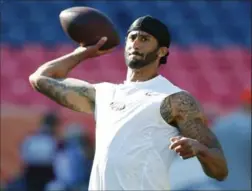  ?? ASSOCIATED PRESS FILE PHOTO ?? “I’m going to continue to stand with the people that are being oppressed. To me, this is something that has to change,” says San Francisco QB Colin Kaepernick.