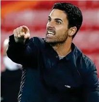  ?? NMC POOL ?? On the back foot: Arteta at Anfield