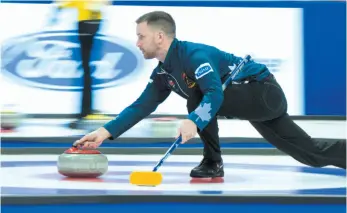  ?? CP PHOTO ?? Brad Gushue throws a stone during an Olympic Trials game against Team Morris on Monday in Ottawa.