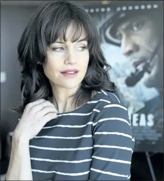  ?? VERONICA HENRI/POSTMEDIA NETWORK ?? Carla Gugino speaks to reporters during a recent stop in Toronto to promote San Andreas.