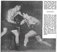  ??  ?? RESPECT: A newspaper clipping featuring action from Walker vs. Natie Brown