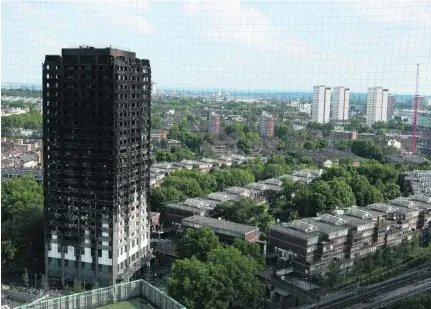  ?? Daniel Leal-Olivas / AFP ?? Press reports of the Grenfell fire in London showed a different side of the Muslim community, including how lives were saved because Muslims attending suhoor were able to help people trapped in the burning building.