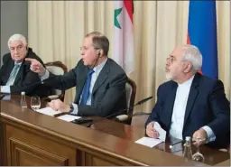  ?? The Associated Press ?? Russian Foreign Minister Sergey Lavrov, centre, Syrian Foreign Minister Walid Muallem, left, and Iranian Foreign Minister Mohammad Javad Zarif hold a news conference Friday in Moscow following talks focused on Syria.