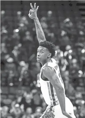  ?? WEBER, THE COMMERCIAL APPEAL MARK ?? Memphis guard Kareem Brewton Jr. celebrates a made 3-pointer against South Dakota State during action at the FedExFourm., Tuesday, December 4, 2018.