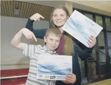  ??  ?? Young stars Jessica and Luca Tappenden-Rowell won carer/helper of the year at the Big Thank You Awards