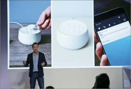  ?? THE ASSOCIATED PRESS ?? Maxime Veron, head of product marketing for Nest Labs, talks about the features of the Nest Secure alarm system during an event in San Francisco. As people get voice-activated speakers and online security cameras for convenienc­e and peace of mind, are...