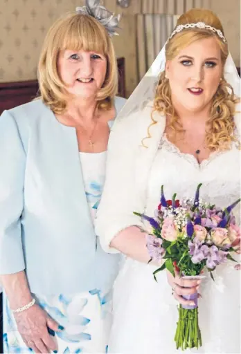  ??  ?? Emma with mum Judy on her wedding day but her dad had already passed away