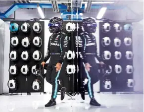  ?? — Reuters ?? Double take: Mercedes’ Lewis Hamilton leaving the pit lane during the Italian Grand Prix on Saturday.